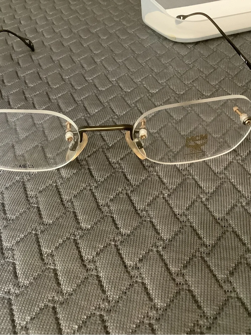 MCM Rimless Titanium Eyeglasses in Gold Tone